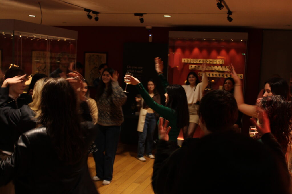 Students dancing in the museum.